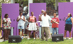 Raphael Green and singers during an outdoor outreach.